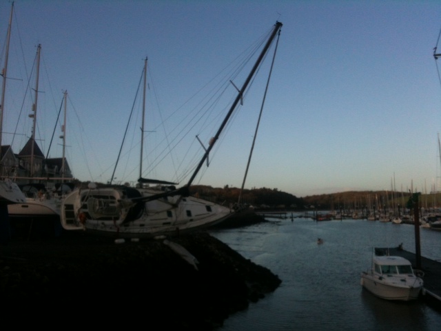 boat fallen over 2 photo