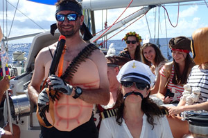 ARC 2016 – Day 11 – Bare-Chested Skipper at the Helm