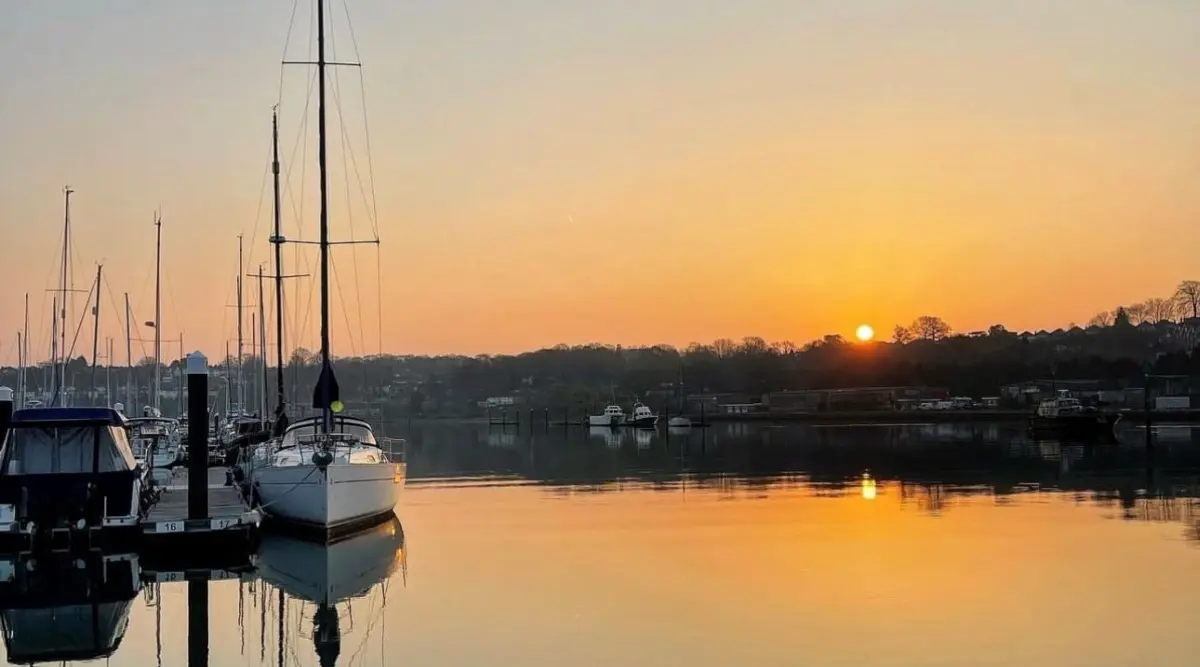 Yachts moored in a quiet Solent marina during an autumn RYA sailing course.