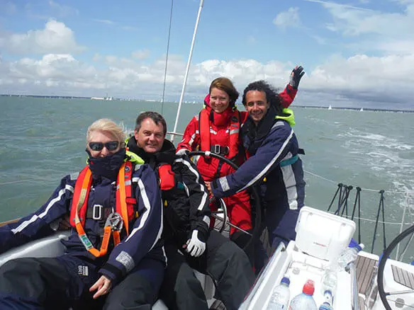 Students learning to sail during an RYA practical course on the Solent near Southampton