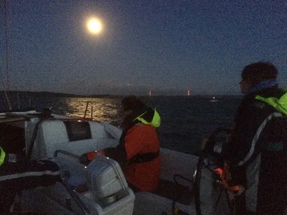 Students practising night navigation during RYA Coastal Skipper course