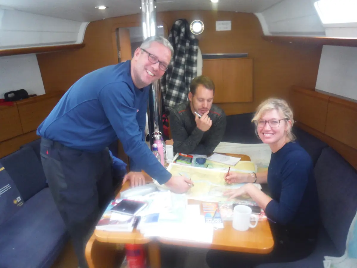 Crew planning a Channel crossing from Southampton to Cherbourg on a mile building sailing weekend