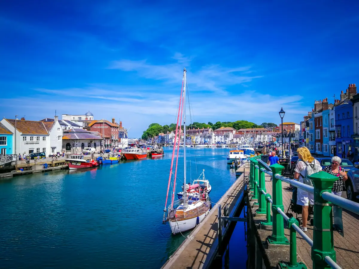 Navigation into Weymouth Harbour during mile building coastal cruise