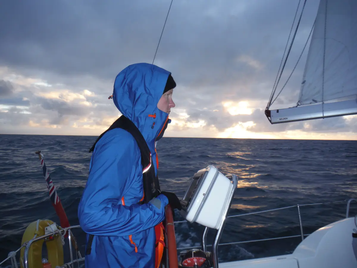 Yacht sailing across the English Channel at sunrise during a weekend Channel Hop